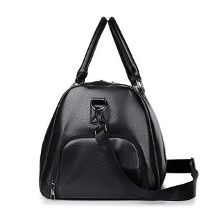 Black lychee pattern travel bag with shoe compartment and adjustable shoulder strap
