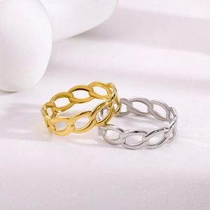 Minimalist gold and silver hollow chain link rings shown in a studio setting