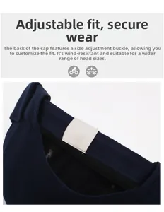 Detail of navy blue cotton docker hat with adjustable silver metal buckle strap