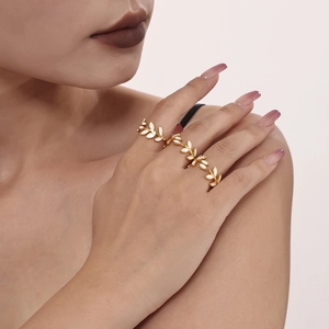 Gold plated stainless steel leaf rings with white enamel drip oil for women