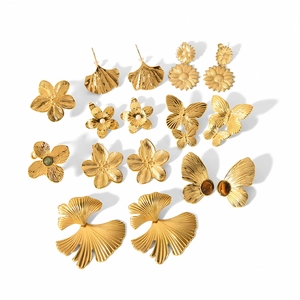 Vintage gold stainless steel earrings set featuring floral, leaf, and butterfly designs