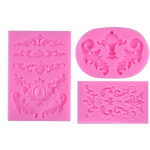 Three pink silicone molds featuring detailed European vintage relief patterns on white background