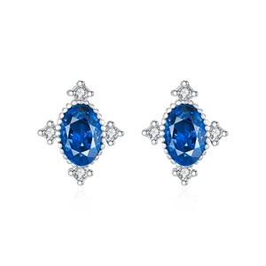 Exquisite S925 sterling silver oval deep blue sapphire stud earrings with zircon accents