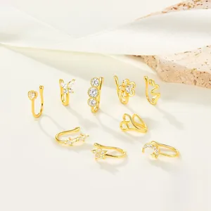 Detailed set of nine gold-plated 925 sterling silver ear cuffs with cubic zirconia accents