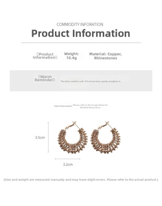 Detail of round pave rhinestone hoop earrings with copper base and silver pins