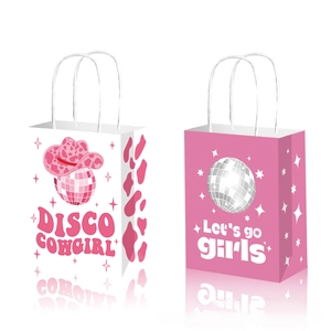 Close-up of Disco Cowgirl gift bags with disco ball patterns and pink rope handles