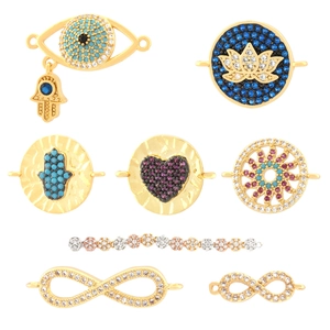 18K gold plated charms featuring evil eye and lotus symbols with micro-pave zircons