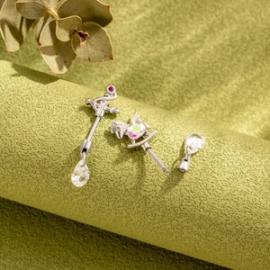 Elegant silver titanium steel unicorn and bow cartilage barbell with iridescent gems