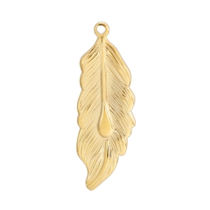 Macro shot of golden feather pendant showing intricate wing textures and metal details