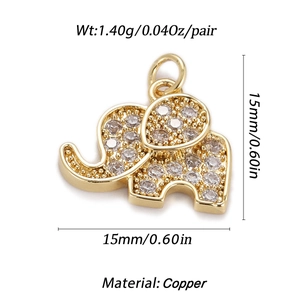 Macro shot of 15mm golden copper elephant pendant with white cubic zirconia details