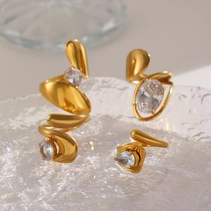 Irregular 18K gold stainless steel ring and earrings set with zircons on glass tray