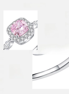 Macro detail of S925 sterling silver stamp and hand-set pink cubic zirconia on the ring