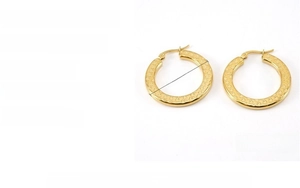 Detail view of 32mm wide chunky gold stainless steel hoop earrings with 18k plating