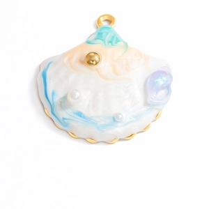 Marine style seashell pendant with blue marble texture and gold metal plating