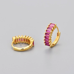 Detail of S925 hallmark on gold-plated huggie earrings with pink rectangular zirconias