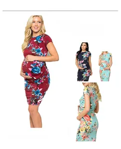 Detailed views of floral print maternity dresses with side pleats and slim fit designs