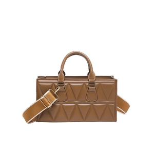 Caramel brown rectangular quilted shoulder bag with double handles and striped strap