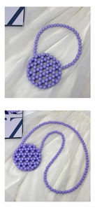Close-up of a handmade purple beaded round crossbody bag on soft white tulle fabric