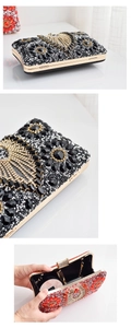 Detail view showing interior space and gold chain strap of the rhinestone evening clutch