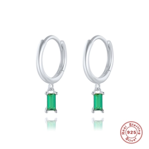 Close-up of S925 sterling silver earrings with rectangular green zircon stone detail