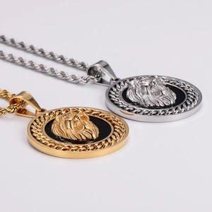 Detailed comparison of gold and silver lion head pendants with thick twist chains