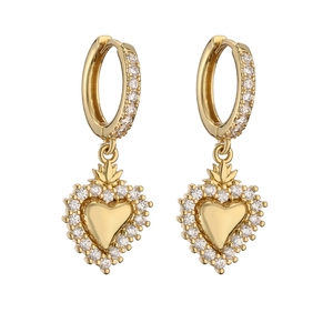 Gold plated heart earrings set with clear zircon stones on a white background
