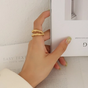French vintage double-layered golden ring with irregular hammered lava texture
