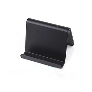 Close-up of a matte black multi-functional desktop stand for phones or name cards