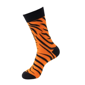 Detail of tiger print crew sock with orange base, black stripes and reinforced heel