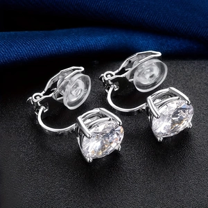 Silver clip-on earrings with zircon stones and silicone pads for non-pierced ears