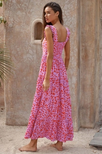 Detail of smocking back and tiered skirt on pink printed bohemian maxi dress