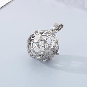 Macro shot of silver hollow spherical incense pendant in titanium steel with buckle
