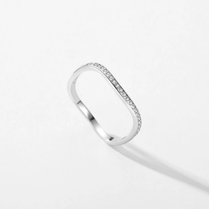 Minimalist S925 sterling silver wave ring with micro-pave zircons on a white background