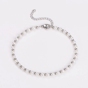 Detail of single strand pearl bracelet with silver beads and adjustable lobster clasp