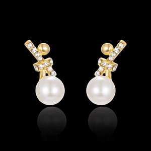 Fashionable gold twist hoop earrings with large champagne pearls and zircon accents