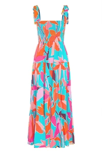 Detail of smocked bodice and wide tie straps on a blue floral tropical maxi dress