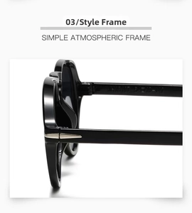 Detail of black oversized sunglasses frame with silver arrow metal hinge accents