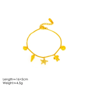 Gold starfish and turtle charm bracelet in stainless steel with crystal accents