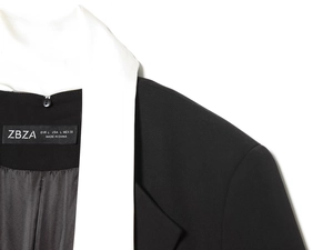 Close-up of black blazer neck label showing ZBZA brand logo and European L size details
