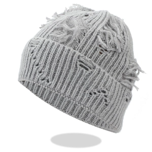 Distressed grey knit beanie featuring aesthetic ripped holes and fringed edge details
