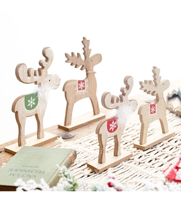 Detailed view of laser-cut wooden Christmas reindeer with festive painted snowflakes