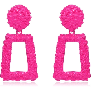 Detail of pink geometric drop earrings with hammered texture and rectangular design
