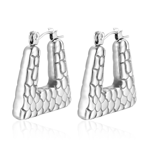 Silver vintage U-shaped earrings with textured scale finish and polished metallic luster