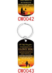 Detail of stainless steel keychain with sunset silhouette print gift for daughter