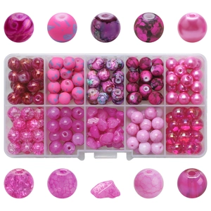 Detail of 10-grid storage box with pink and purple glass beads for DIY bracelet making