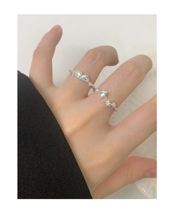 Close-up of S925 silver open rings featuring moon, star, and zircon details on hand