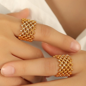 Luxe 18k gold mesh hollow ring with Czech diamonds on female hand model
