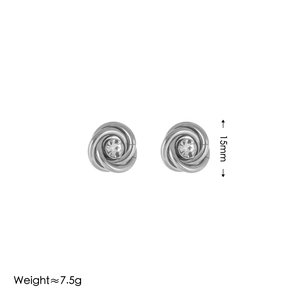 Detailed view of silver knot earrings with crystal, showing 15mm height and 7.5g weight