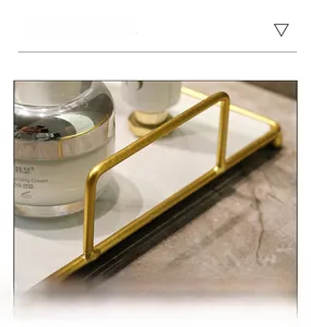 Detail of handcrafted gold metal frame with durable welding on bathroom organizer tray