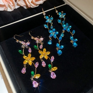 Elegant gold butterfly and flower tassel earrings with multi-colored sparkling zircons